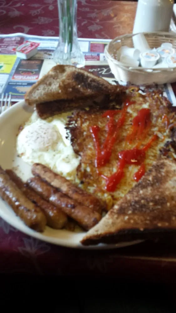 Eggs over Easy Hashbrowns Sausage and Toast